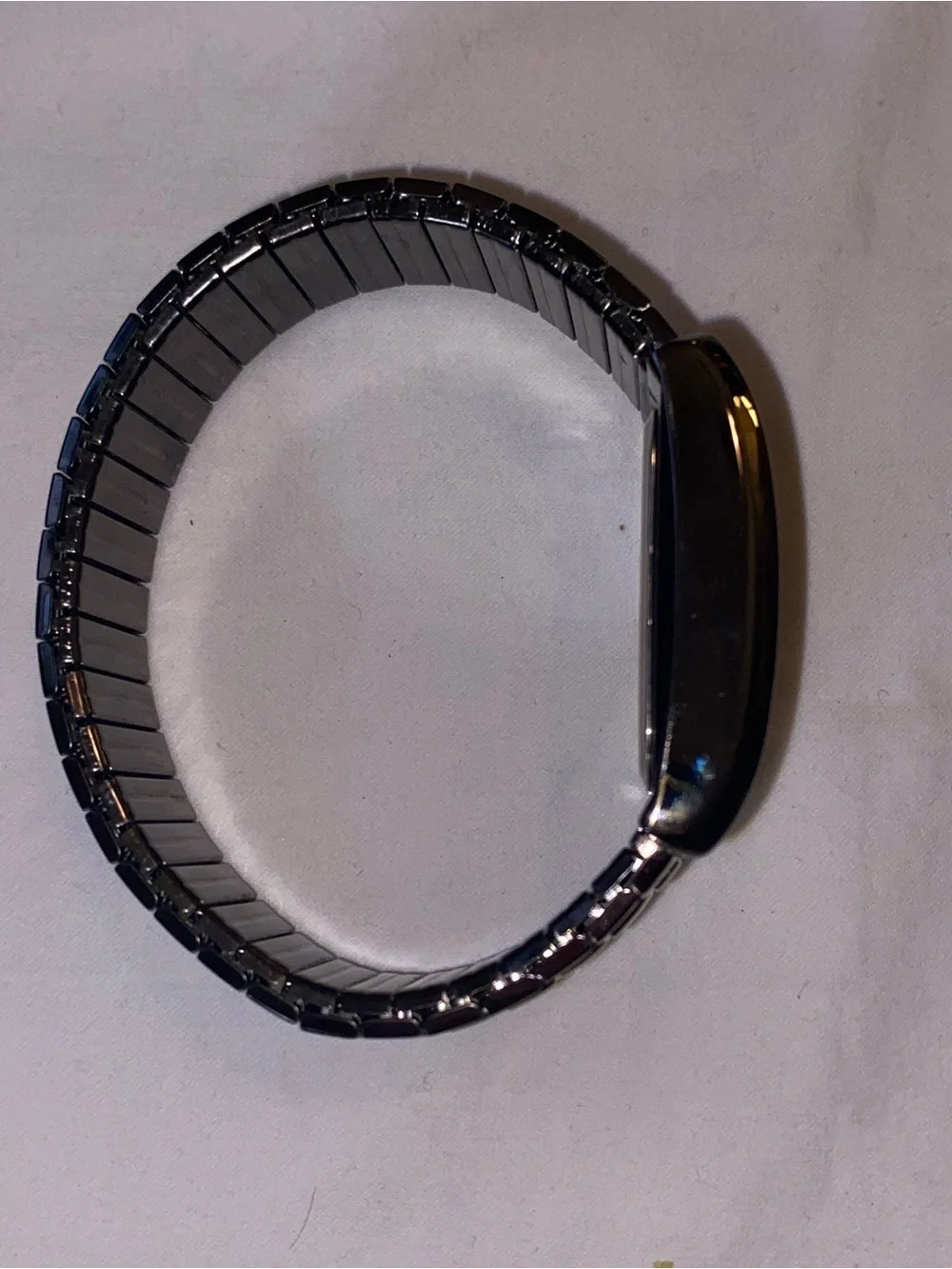Black and Gold Rectangular Bracelet Watch with Iridescent Dial